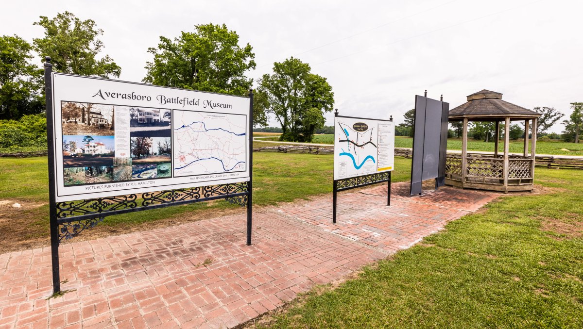 Maps and signs outside at Averasboro Battlefield Museum in middle of field