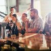 People drinking hard cider at bar of Bold Rock.